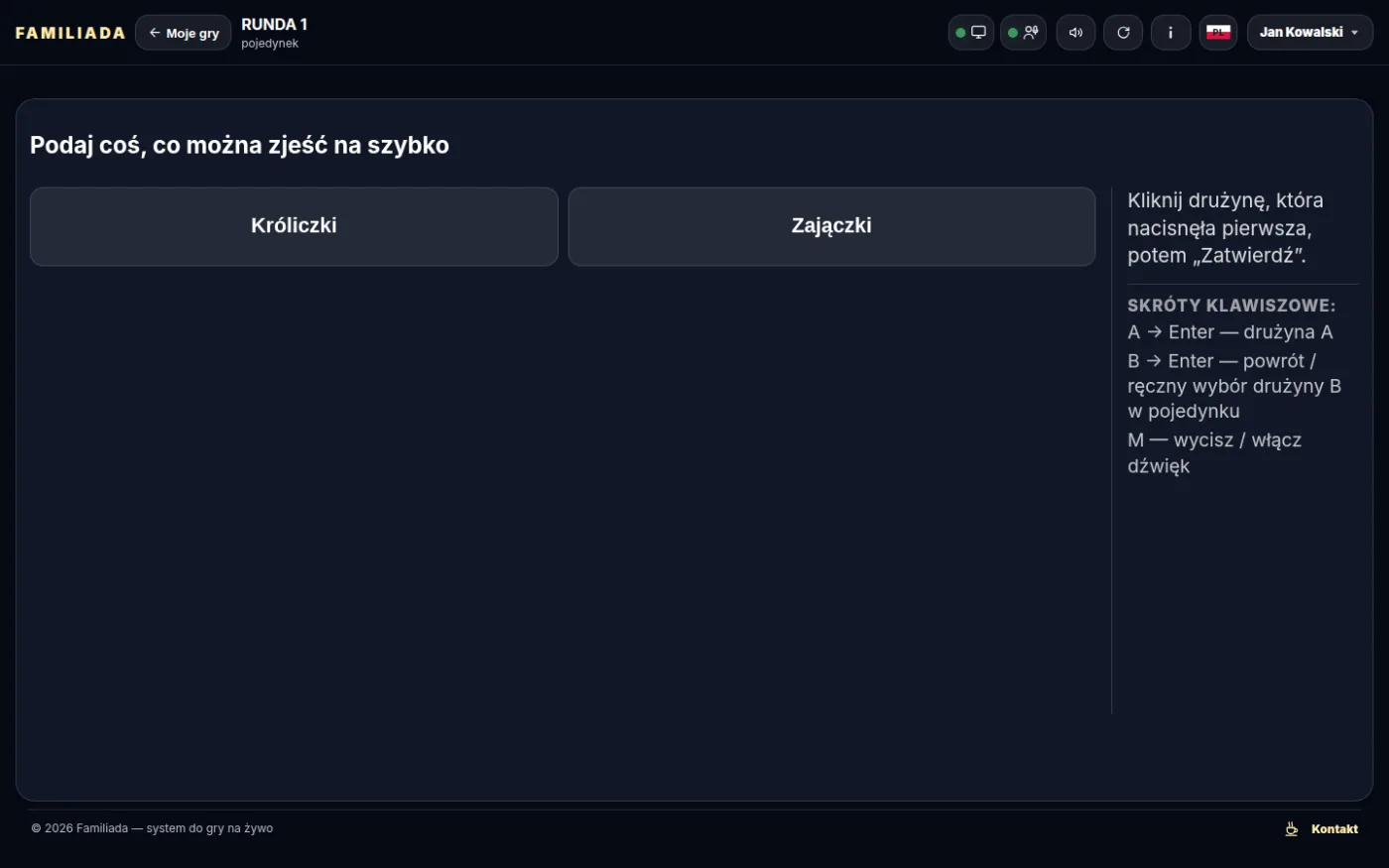 Przycisk fizyczny — operator wybiera drużynę
